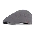 Retro distressed dark gray cotton newsboy cap with textured grid stitching and fashion tag - Adjustable / Gray