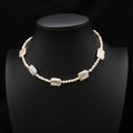 Elegant natural freshwater pearl necklace with baroque and round pearls on black bust stand - White Square Spaced Style
