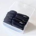Clear plastic box containing multiple soft black round powder puffs with ribbon handles - 12pcs in Box / Black