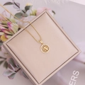 Detailed view of 18K gold scorpion zodiac pendant with sparkling CZ stones on jewelry box - 8#Scorpio