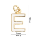 Macro shot of letter E gold pendant with white enamel detailing and size measurements - Letter E