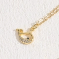 Golden whale necklace with sparkling zircons and a deep blue gemstone eye detail - Whale 14K Gold
