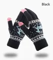 Detailed close-up of black knitted gloves with pink touchscreen tips and elk patterns - Black