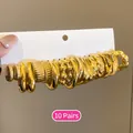 Set of 10 pairs of vintage golden hoop earrings featuring various twisted and smooth designs - 66# Steel Pin (20-Piece Set) / Gold