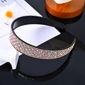 Sparkling black headband with multi-colored rhinestones and golden beads on reflective base - Big Champagne Rhinestone