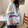 Blue and white striped canvas tote bag with cute animal cartoon prints and shoulder strap - Animal Pear Journal