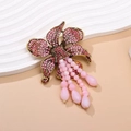 Elegant gold-tone flower brooch with pink rhinestones and beaded tassels - Vintage Pink Rhinestone Fringe Large Flower / Pink