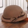 Macro detail of brown wool beret featuring elegant rolled brim and 3D bow decoration - M (56-58cm) / Camel