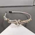Elegant crystal headband with smoky gray and clear rhinestones on silver-grey fabric band - Gray