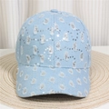 Close-up of light blue denim baseball cap with distressed holes and silver sequins - Style 26-Light Blue Denim Sequin Distressed