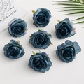 Set of seven dark blue-grey artificial silk rose heads on a modern white surface - Navy Blue