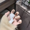 Short square press-on nails in deep brown and caramel with plaid and sweater textures - Dark Brown Maillard Plaid 3D Relief Style (JP3623)