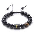 Close-up of adjustable obsidian bead bracelet with Tiger Eye stone and letter T charm - Letter T