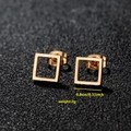 Minimalist square geometric gold stud earrings for women on a textured background - Square / Rose Gold