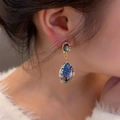 Vintage 18K gold plated drop earrings featuring blue dried flowers and dark grey resin stones - Blue Tree of Life