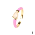 Adjustable gold ring with pink enamel band and a teardrop-shaped gemstone inlay - Opaline Water Drop / Pink