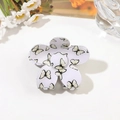 Detailed top view of a white flower hair claw clip with yellow butterfly prints - 7cm Flower / Light Yellow Butterfly