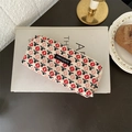 Floral corduroy pencil case with Merci Paris label on vintage books background - Little Red Flower