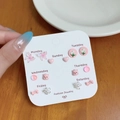 Set of 7 pairs of sweet pink stud earrings featuring butterflies and flowers on card - FL6 Pink Loopy Stud Earrings Set / 7 Pairs Set