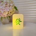 Mahjong tile night light with green character Fa on a warm yellow glowing body - Large Fortune Mahjong