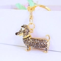 Golden dachshund keychain with grey crystals and shiny alloy finish for bag decor - Individual Packaging / Gray