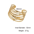 Brazalete abierto dorado de capas con textura martillada irregular y líneas caladas - Dorado
