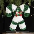 Green and white striped candy cane Christmas ornament with red bow and berry detail - Green & White Candy Cane