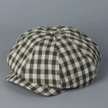Primer plano de gorra newsboy vintage de lino a cuadros verdes y blancos con botón superior - M (56-58cm) / Cuadros Verdes