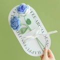 Handmade crochet bouquet with blue and white roses on a white card with ribbon - Rose (Blue + Gradient Blue)