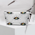 Waterproof travel makeup bag with rainbow evil eye pattern on a canvas toiletry case - White Rainbow Eye