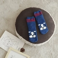 Thick coral fleece socks in blue featuring a cute white dog pattern and red stripes - One Size / Navy Blue
