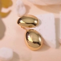 Polished gold oval stud earrings displayed on white textured stone background - Smooth Oval Minimalist (E0873)