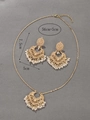 Detail of bohemian gold earrings and necklace set with hollow floral patterns and beads - Necklace and Earring Set