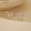 Elegant 925 sterling silver bow stud earrings with twisted rope texture in silver finish - 925 Silver / Silver-A