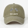 Detailed macro view of PIT CREW racing flags print on vintage washed khaki cotton cap - Dark Khaki