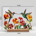 Detail view of hummingbird and floral acrylic ornament with size 21x15cm and wooden base - Style BTU425 With Large Wood Base