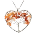 Detailed view of silver wire tree of life heart pendant with colorful crystals - Red Agate