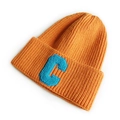 Vibrant orange knit beanie featuring a blue towel-embroidered letter C on the cuff - Orange