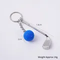 Miniature golf club and blue golf ball keychain made of silver-colored metal - Blue Golf Ball + Club