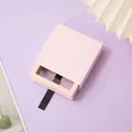 Matte pink drawer jewelry box with black ribbon puller on purple aesthetic background - Light Pink Drawer + Pink Box / Round Base