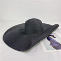 Fashionable black wide brim straw sun hat with woven texture for beach and vacation - M (56-58cm) Adjustable / Black