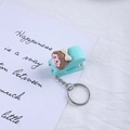 Minitaler-Schlüsselanhänger in Minzgrün mit braunem Cartoon-Mädchen und silbernem Ring - Minzgrünes Mädchen