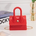 Mini red PVC jelly bag for women featuring a gold snap buckle and gold chain strap - Red