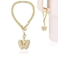 Golden iced-out letter W charm with bubble design and cubic zirconia on cuban chain - Letter W