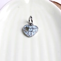 Silver alloy heart jigsaw charm with light blue enamel on white ceramic tray - Light Green