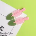 Detail of popsicle hair clip measuring 6.1cm by 1.8cm in pink and green colors - Pink Gradient