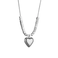 Close-up of a silver heart pendant necklace with cube beads in polished titanium steel - 3D Heart Style (N1230) / Silver