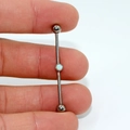 G23 titanium industrial barbell earring with a central white opal stone setting - Opal (OP16)