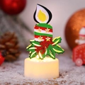 Candela LED natalizia con stella rossa e decorazione di agrifoglio su base beige - Candela