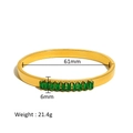 Detail view of gold-plated bangle with green zircon stones showing 61mm inner diameter - Gold / Green Zirconia / 61mm